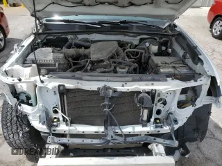 2018 Toyota Tacoma SR z VIN 5TFRX5GN7JX128181, wystawiony jako Copart lot #50954515 z przebiegiem 144 125 mil mil oraz Szkoda całkowita • Salvage title. Historia ofert i sprzedaży dostępna na DreamBid. Obrazek 11.