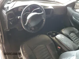 2000 Ford F-150 XL z VIN 2FTRX07L5YCB06306, wystawiony jako Copart lot #66777554 z przebiegiem Nie podano mil oraz Szkoda całkowita • Salvage title. Historia ofert i sprzedaży dostępna na DreamBid. Obrazek 8.