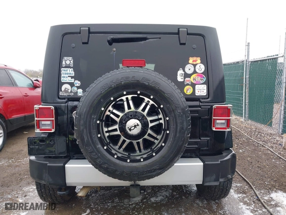 2011 Jeep Wrangler Unlimited Sahara with VIN 1J4BA5H12BL548870, listed as a IAAI auction lot 42010303 with 139,693 mi miles. Bid and sale history available at carsss.com. Image 16.