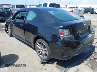 2014 Scion tC with VIN JTKJF5C71E3072199, listed as a IAAI auction lot 41956178 with 154,730 mi miles. Bid and sale history available at carsss.com. Image 3.