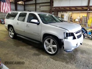 2013 Chevrolet Suburban LT with VIN 1GNSCJE00DR260275, listed as a Copart auction lot 50394425 with 140,464 mi miles and Salvage title. Bid and sale history available at DreamBid. Image 4.