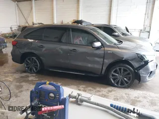 2019 Acura MDX Technology with VIN 5J8YD4H0XKL025557, listed as a IAAI auction lot 42365567 with 102,733 mi miles and . Bid and sale history available at DreamBid. Image 13.