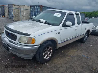 1997 Ford F-150 XL z VIN 1FTEX17L1VNB15658, wystawiony jako IAAI lot #42353422 z przebiegiem 217 975 mil mil oraz . Historia ofert i sprzedaży dostępna na DreamBid. Obrazek 2.