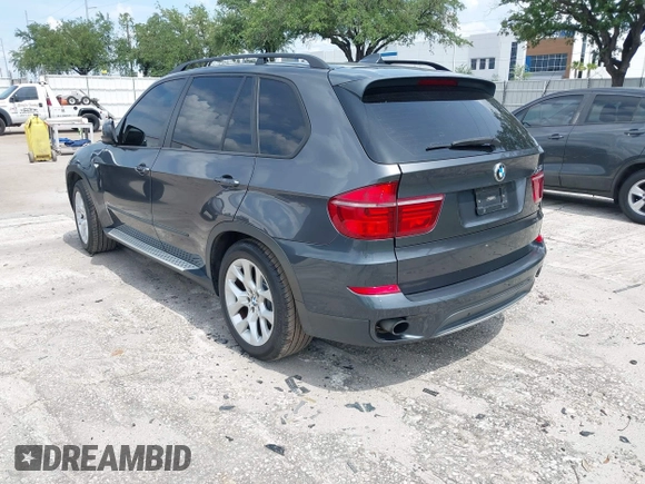 2012 BMW X5 35i z VIN 5UXZV4C5XCL990728, wystawiony jako IAAI lot #42386095 z przebiegiem 124 613 mil mil oraz . Historia ofert i sprzedaży dostępna na DreamBid. Obrazek 3.