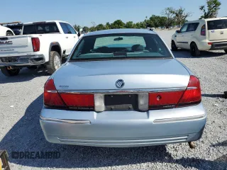 1999 Mercury Grand Marquis GS z VIN 2MEFM74W5XX711421, wystawiony jako Copart lot #53062605 z przebiegiem 106 913 mil mil oraz Nie do naprawy • Non repairable. Historia ofert i sprzedaży dostępna na DreamBid. Obrazek 6.