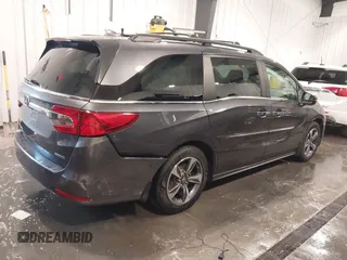 2018 Honda Odyssey Touring with VIN 5FNRL6H84JB041309, listed as a IAAI auction lot 42272247 with 90,371 mi miles and . Bid and sale history available at DreamBid. Image 4.