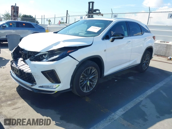 2021 Lexus RX with VIN 2T2SZMDA8MC289158, listed as a IAAI auction lot 41403874 with 84,981 mi miles. Bid and sale history available at carsss.com. Image 17.
