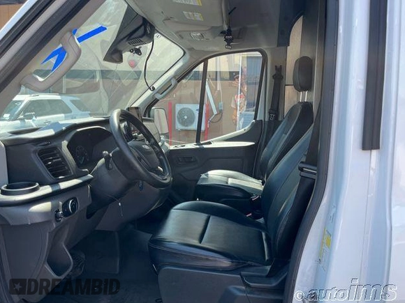 2020 Ford Transit Cargo with VIN 1FTBR3X85LKB54305, listed as a IAAI auction lot 42868187 with 82,829 mi miles and . Bid and sale history available at DreamBid. Image 3.