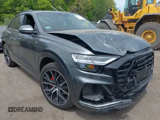 2021 Audi Q8 Premium Plus with VIN WA1EVAF14MD036327, listed as a IAAI auction lot 42237144 with 59,157 mi miles and . Bid and sale history available at DreamBid. Image 1.