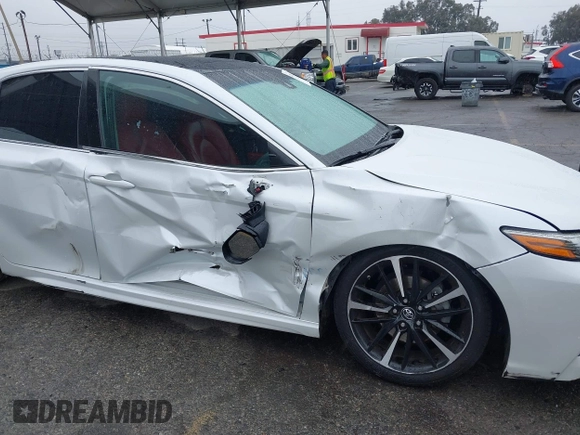 2018 Toyota Camry XSE with VIN 4T1BZ1HK8JU019394, listed as a IAAI auction lot 41492529 with 107,745 mi miles and . Bid and sale history available at DreamBid. Image 6.