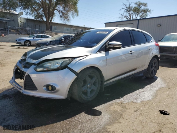 2014 Ford Focus SE with VIN 1FADP3K22EL169090, listed as a Copart auction lot 74069884 with 101,881 mi miles and Salvage Title. Bid and sale history available at carsss.com. Image 1.