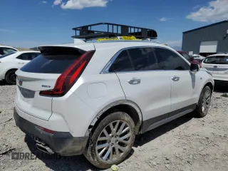 2023 Cadillac XT4 AWD Premium Luxury with VIN 1GYFZDR46PF130198, listed as a Copart auction lot 57763285 with 8,346 mi miles and Salvage title. Bid and sale history available at DreamBid. Image 3.