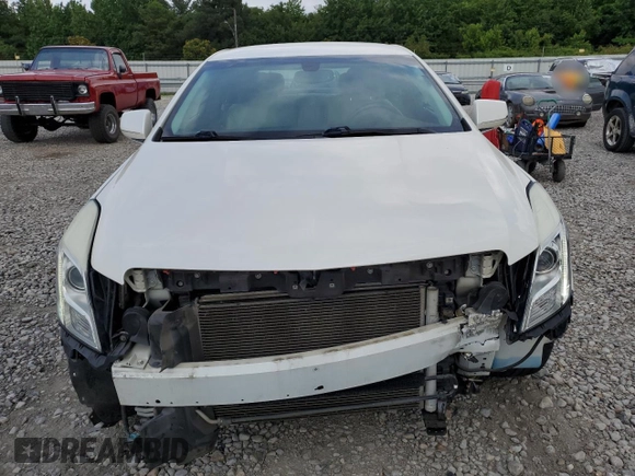 2013 Cadillac XTS Luxury with VIN 2G61P5S33D9125769, listed as a Copart auction lot 59671015 with 143,583 mi miles and Salvage title. Bid and sale history available at DreamBid. Image 5.