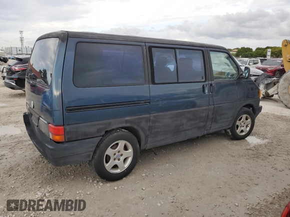 1993 Volkswagen EuroVan с VIN WV2MC0707PH010911, выставлен на аукционе Copart как лот 78414594 с пробегом 191 174 миль миль и Чистый • Clean title. История ставок и продаж доступна на DreamBid. Изображение 3.