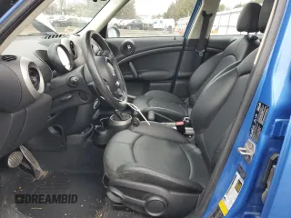 2012 MINI Countryman S with VIN WMWZC5C57CWL62540, listed as a Copart auction lot 43735105 with 86,558 mi miles and Salvage Title. Bid and sale history available at DreamBid. Image 7.