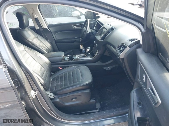 2016 Ford Edge SEL with VIN 2FMPK3J94GBC41068, listed as a IAAI auction lot 41007094 with 124,418 mi miles. Bid and sale history available at carsss.com. Image 5.