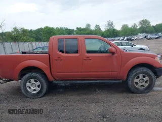 2005 Nissan Frontier LE with VIN 1N6AD07W25C462629, listed as a IAAI auction lot 42237382 with 157,460 mi miles and . Bid and sale history available at DreamBid. Image 14.