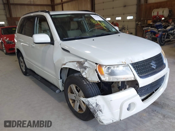 2009 Suzuki Grand Vitara z VIN JS3TD044294100168, wystawiony jako IAAI lot #42489252 z przebiegiem 152 679 mil mil oraz . Historia ofert i sprzedaży dostępna na DreamBid. Obrazek 6.