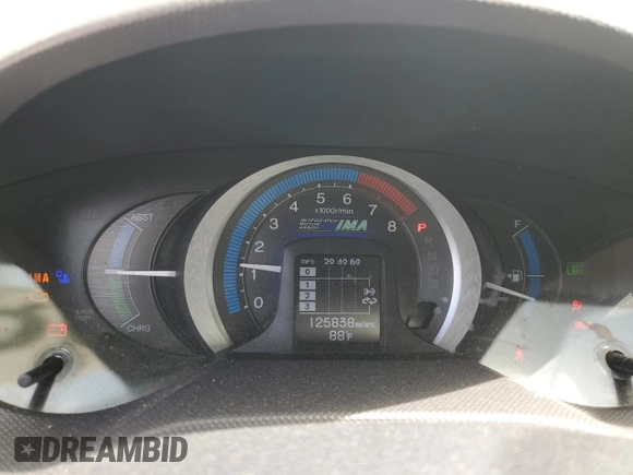2010 Honda Insight EX with VIN JHMZE2H74AS032878, listed as a Copart auction lot 56230795 with 125,838 mi miles and Clean title. Bid and sale history available at DreamBid. Image 9.