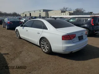 2014 Audi A8 3.0T z VIN WAURGAFD5EN007438, wystawiony jako Copart lot #47979945 z przebiegiem 147 236 mil mil oraz Szkody całkowita. Historia ofert i sprzedaży dostępna na DreamBid. Obrazek 2.