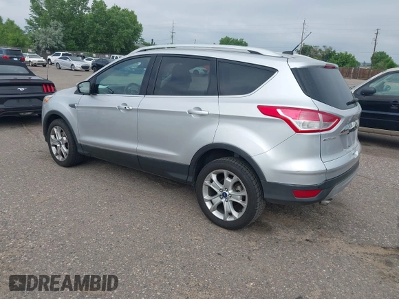 2016 Ford Escape Titanium with VIN 1FMCU9JX3GUC86930, listed as a IAAI auction lot 42582263 with 113,386 mi miles and . Bid and sale history available at DreamBid. Image 3.