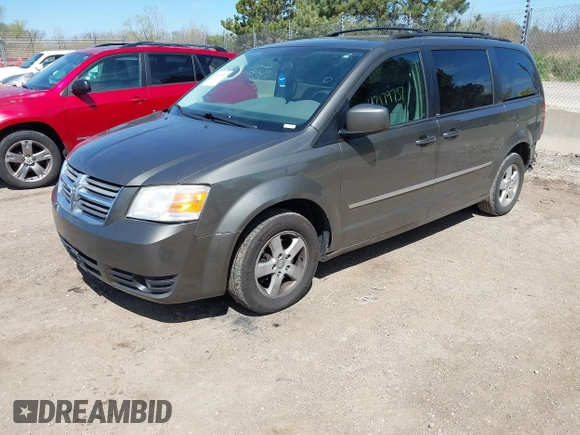 2010 Dodge Grand Caravan SXT with VIN 2D4RN5D1XAR293862, listed as a IAAI auction lot 42179737 with 324,144 mi miles and . Bid and sale history available at DreamBid. Image 17.