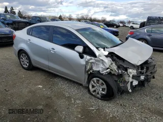 2016 Kia Rio LX with VIN KNADM4A38G6584710, listed as a Copart auction lot 45374045 with 97,932 mi miles and Salvage Title. Bid and sale history available at carsss.com. Image 4.