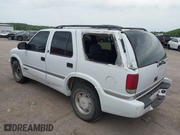 2001 GMC Jimmy SLE z VIN 1GKCS13W312208879, wystawiony jako IAAI lot #42284916 z przebiegiem 204 219 mil mil oraz . Historia ofert i sprzedaży dostępna na DreamBid. Obrazek 3.