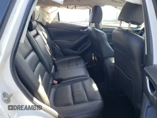 2014 Mazda CX-5 Grand Touring with VIN JM3KE4DY6E0376413, listed as a Copart auction lot 53204935 with 126,791 mi miles and Salvage Title. Bid and sale history available at DreamBid. Image 11.