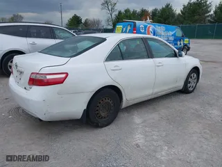 2007 Toyota Camry CE with VIN 4T1BE46KX7U664699, listed as a IAAI auction lot 42040572 with 201,624 mi miles. Bid and sale history available at carsss.com. Image 4.