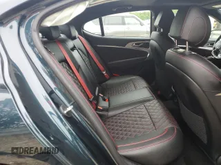 2022 Genesis G70 3.3T with VIN KMTG54TEXNU083193, listed as a Copart auction lot 56627395 with 16,980 mi miles and Salvage title. Bid and sale history available at DreamBid. Image 10.