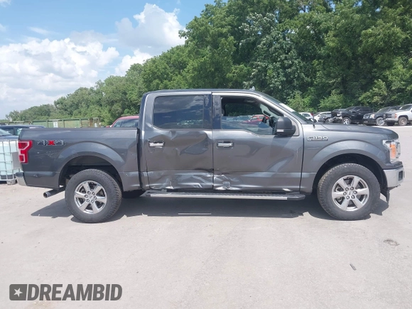 2018 Ford F-150 XL with VIN 1FTEW1E57JFA95086, listed as a IAAI auction lot 42574704 with 77,301 mi miles and . Bid and sale history available at DreamBid. Image 13.