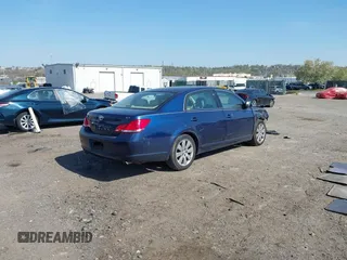 2005 Toyota Avalon XL with VIN 4T1BK36B55U054645, listed as a IAAI auction lot 42069828 with 184,789 mi miles and . Bid and sale history available at carsss.com. Image 4.