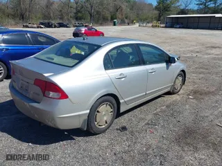 2009 Honda Civic Hybrid with VIN JHMFA36249S000925, listed as a IAAI auction lot 41823981 with 201,346 mi miles. Bid and sale history available at carsss.com. Image 4.