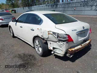 2009 Nissan Maxima SV with VIN 1N4AA51E79C861010, listed as a IAAI auction lot 42135001 with 154,557 mi miles and . Bid and sale history available at DreamBid. Image 3.