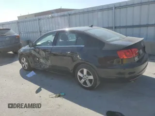 2014 Volkswagen Jetta TDI w/Premium with VIN 3VW3L7AJ2EM392016, listed as a Copart auction lot 69305904 with 111,903 mi miles and Salvage title. Bid and sale history available at DreamBid. Image 2.
