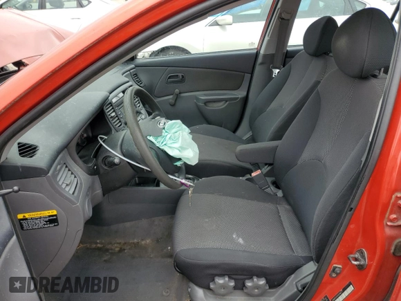 2007 Kia Rio LX with VIN KNADE123376248277, listed as a Copart auction lot 66108224 with 117,618 mi miles and Salvage Title. Bid and sale history available at carsss.com. Image 7.