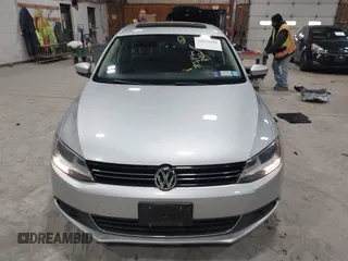 2014 Volkswagen Jetta Sedan SE w/Connectivity/Sunroof PZEV with VIN 3VWD17AJ9EM437804, listed as a IAAI auction lot 42026842 with 83,114 mi miles. Bid and sale history available at carsss.com. Image 12.