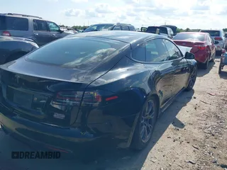 2022 Tesla Model S Plaid with VIN 5YJSA1E63NF478351, listed as a IAAI auction lot 42056199 with Not provided miles and . Bid and sale history available at DreamBid. Image 4.