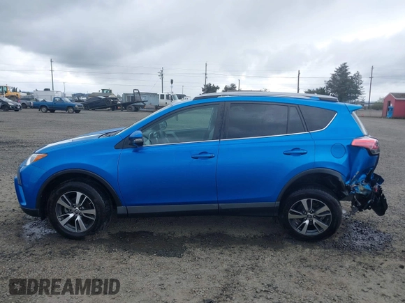 2018 Toyota RAV4 XLE with VIN 2T3RFREV0JW722354, listed as a IAAI auction lot 41974466 with 65,013 mi miles. Bid and sale history available at carsss.com. Image 15.