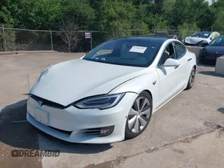 2020 Tesla Model S Long Range with VIN 5YJSA1E29LF389023, listed as a IAAI auction lot 42509364 with 93,070 mi miles and . Bid and sale history available at DreamBid. Image 2.