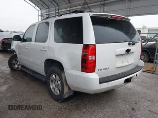 2013 Chevrolet Tahoe LS with VIN 1GNSCAE05DR276326, listed as a IAAI auction lot 41894489 with 173,183 mi miles and . Bid and sale history available at DreamBid. Image 3.