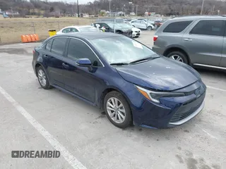 2023 Toyota Corolla Hybrid LE with VIN JTDBCMFE7PJ001872, listed as a IAAI auction lot 41529174 with 13,838 mi miles. Bid and sale history available at carsss.com. Image 1.