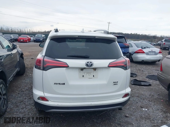 2018 Toyota RAV4 XLE with VIN JTMRFREV8JJ225065, listed as a IAAI auction lot 41940678 with 145,074 mi miles. Bid and sale history available at carsss.com. Image 16.