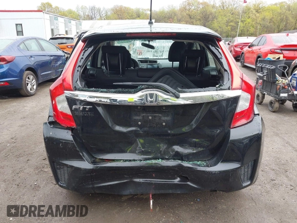 2015 Honda Fit EX-L with VIN 3HGGK5H88FM726406, listed as a IAAI auction lot 42033501 with 124,216 mi miles. Bid and sale history available at carsss.com. Image 16.