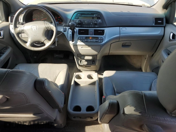 2010 Honda Odyssey EX-L with VIN 5FNRL3H62AB031763, listed as a Copart auction lot 52800055 with 220,450 mi miles and Salvage Title. Bid and sale history available at DreamBid. Image 8.