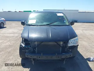 2016 Dodge Grand Caravan SXT with VIN 2C4RDGCG0GR387856, listed as a IAAI auction lot 41769163 with 103,856 mi miles and . Bid and sale history available at DreamBid. Image 13.