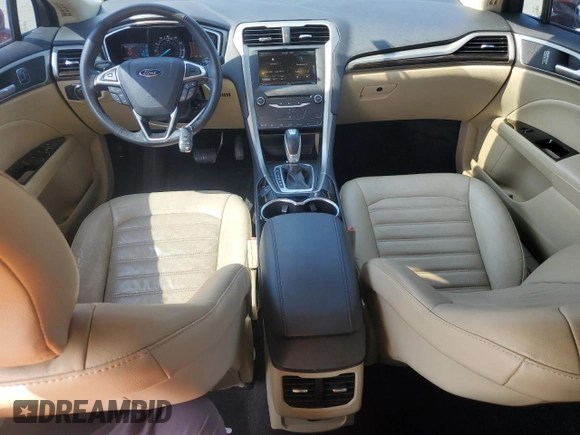 2015 Ford Fusion SE z VIN 3FA6P0H97FR288087, wystawiony jako Copart lot #57446515 z przebiegiem 87 472 mil mil oraz Szkoda całkowita • Salvage title. Historia ofert i sprzedaży dostępna na DreamBid. Obrazek 8.