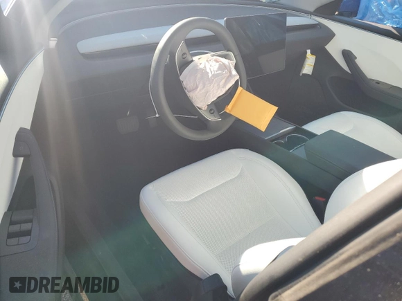 2024 Tesla Model 3 z VIN 5YJ3E1EA9RF868731, wystawiony jako Copart lot #58517675 z przebiegiem Nie podano mil oraz Nie do naprawy. Historia ofert i sprzedaży dostępna na DreamBid. Obrazek 8.