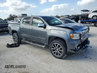 2021 GMC Canyon 4WD Denali with VIN 1GTG6EEN7M1281163, listed as a Copart auction lot 78996944 with 49,299 mi miles and Non Repairable. Bid and sale history available at carsss.com. Image 4.